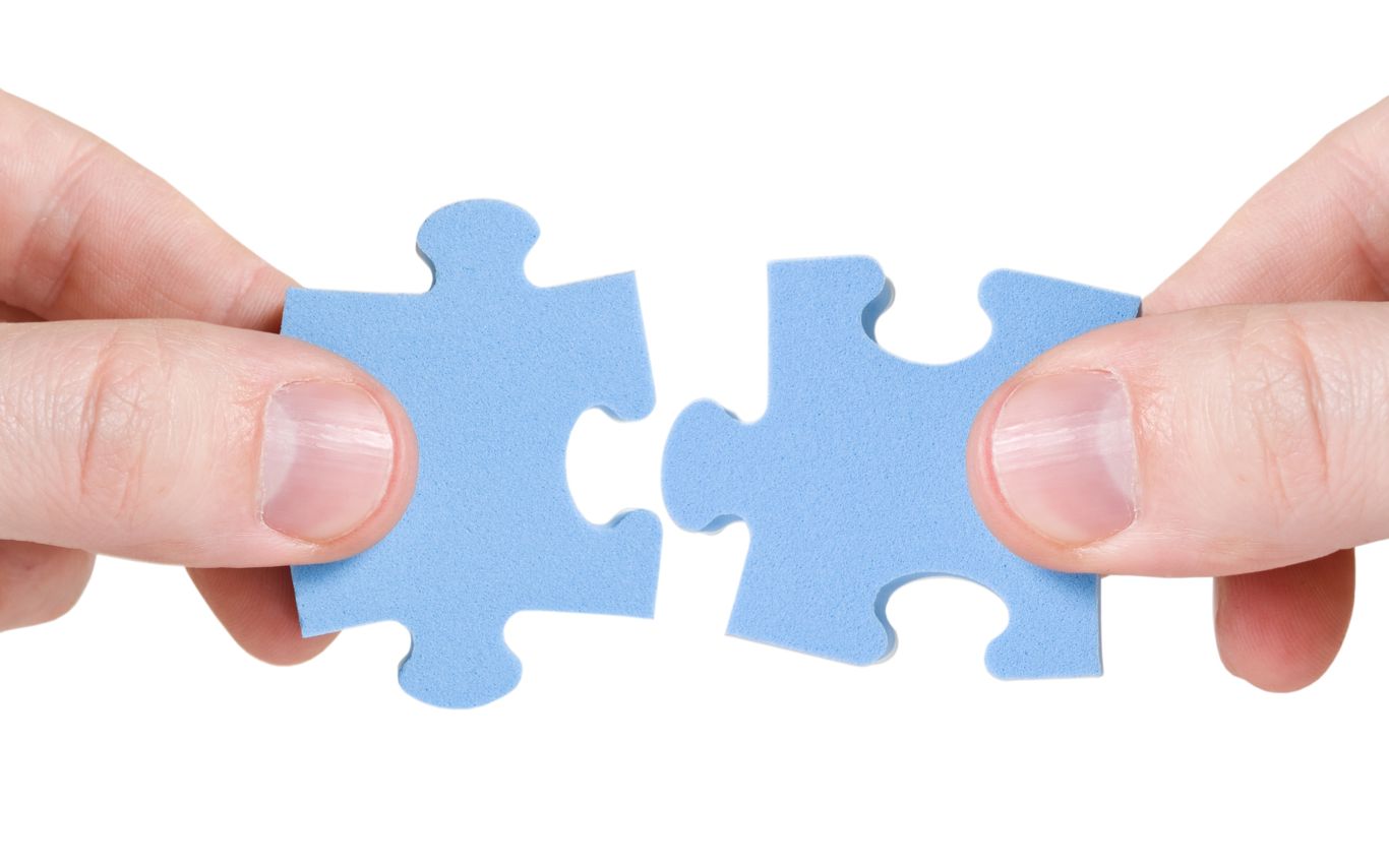 Billede af to brikker der passer sammen